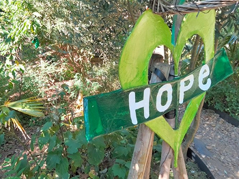 Grenfell paper heart with the words 'hope' written across it in a banner