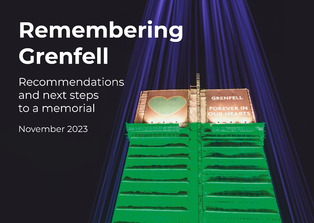 Remembering grenfell leaflet, looking up at the tower lit up at night