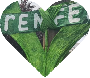Grenfell heart with a banner in the middle reading 'grenfell'