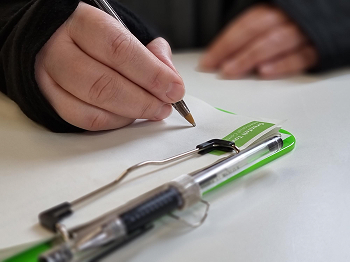 Person writing a message