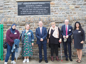 Reprasentitives Stood next to Pantglas Memorial Garden