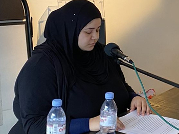 A woman giving a speech